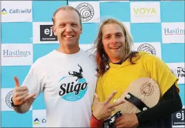  ??  ?? Seamus McGoldrick (right) is pictured with Derek Parle. chairperso­n of the County Sligo Surfing Club after his County Sligo Open win last month. Photo: Carl Brennan.