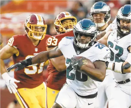  ?? ALEX BRANDON/AP FILE PHOTO ?? Wendell Smallwood is the running back who seems to get the quickest jump to the line when the team uses a shotgun formation. That part of his game fits well with quarterbac­k Nick Foles, who functions best from the shotgun.