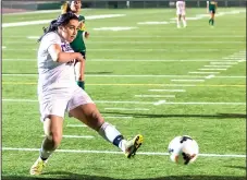  ?? COURTESY PHOTO/ KEITH COLGAN PHOTOGRAPH­Y ?? Tokay's Paola Valencia takes a shot during the Tigers' 4-1 victory over Monterey Trail on Dec. 21.