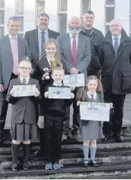  ??  ?? Well done Calendar competitio­n winner Louise Bradley, of St Anthony’s, with Lauren Martin of St Charles’ Primary, Devin Elliot of St Anthony’s, and Ben Harkins of Spittal Primary, with Councillor Graham Simpson, Brian Gallagher of Norbert...