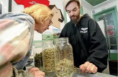  ?? PHOTO: AP ?? Medicinal cannabis on the counter in San Francisco. Hikurangi believes cannabis could rival dairy and kiwifruit in terms of export earnings.