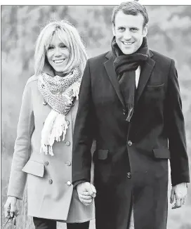  ??  ?? Brigitte Trogneux and French presidenti­al candidate Emmanuel Macron have been married nine years — after meeting when he was 15 and she was a teacher.