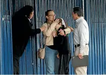  ?? PHOTO: REUTERS ?? A woman hugs a student outside the Colegio Americano del Noreste after a teenage student shot several students and a teacher before killing himself.