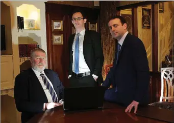  ?? Photo Valerie O’Sullivan ?? Ian Holohan (Right) and Michael Walker (Left) with Donald O’Sullivan who is joining them as a Director at Curran Moore and Company Accountant­s in Killarney.