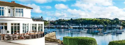  ??  ?? WATERSIDE WELCOME: The Greenbank Hotel. Below: Tempting food is on offer at its Water’s Edge restaurant