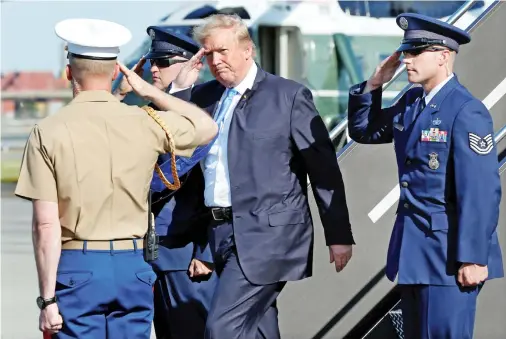  ??  ?? US President Donald Trump has arrived in New Jersey to spend the weekend in his golf club in Bedminster. (Reuters)