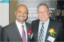  ??  ?? Award recipient Prime Real Estate Group’s Harwinder Kang, left, is pictured with Servpro vice-president Mark Lunnin. Servpro has been an invaluable sponsor of the awards for many years.