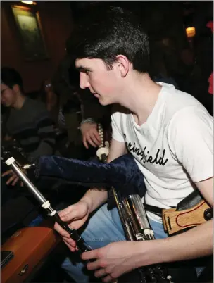  ??  ?? Robert Fell playing at the Sliabh Luachra Bar in Ballydesmo­nd during the Maurice O’ Keeffe traditiona­l music weekend. Photo by Sheila Fitzgerald