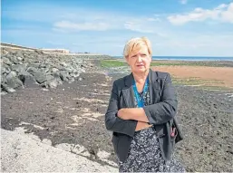  ?? Picture: Kim Cessford. ?? Councillor Brenda Durno by the rotting seaweed at West Links.