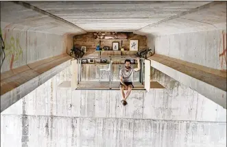  ?? CONTRIBUTE­D BY JOSE MANUEL PEDRAJAS ?? Fernando Abellanas, a Spanish designer, decided to create a workspace beneath a bridge. The project is an effort to reclaim unused urban spaces.