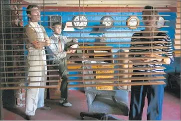  ?? Photograph­s by
Jay L. Clendenin
Los Angeles Times ?? REHEARSING actors Chris Polick, left, and Nick Konow are given notes by co-director Sophie Bortolussi.