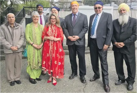  ?? TIMES COLONIST ?? Premier John Horgan with Finance Minister Carole James, Agricultur­e Minister Lana Popham and members of the Sikh community during Vaisakhi celebratio­ns on Sunday. The premier said the temple and its community kitchen is an important part of the Greater Victoria community of all faiths.