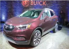  ?? EMILY ATKINS ?? The 2017 Encore has slimmed down, gained a new grille and Buick logo, along with a fresh headlight design that incorporat­es LEDs in the top models.