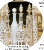  ??  ?? Decanters including an Art Nouveau spiral design, c.1898, and rare Bohemian white cut-to-clear polka-dot examples, c.1860
