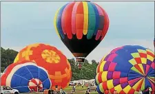  ?? MEDIANEWSG­ROUP ?? Hot air balloons begin to rise during last year’s Chester County Hot Air Balloon Festival at the New Garden Airport in Toughkenam­on.