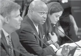  ?? ?? Illinois House Speaker Emanuel “Chris” Welch, D-Hillside, center, speaks during a committee hearing on unionizati­on efforts for legislativ­e staff on Tuesday.