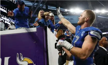  ?? ?? Detroit Lions defensive end Aidan Hutchinson (97) celebrates the win against the Minnesota Vikings with fans. Photograph: Matt Krohn/ USA Today Sports