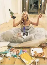  ??  ?? JUST PLANE CUTE: “Flight Attendant” leading lady Kaley Cuoco (in an Oscar de la Renta gown) unwinds post-show with pizza, mac ’n’ cheese and, yep, a cake with her picture on it.