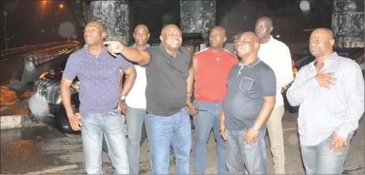  ??  ?? Ambode (2nd left) with his security chiefs, ACP Imohimi Edgal and RRS Commander, ACP Olatunji Disu, pointing to something of importance