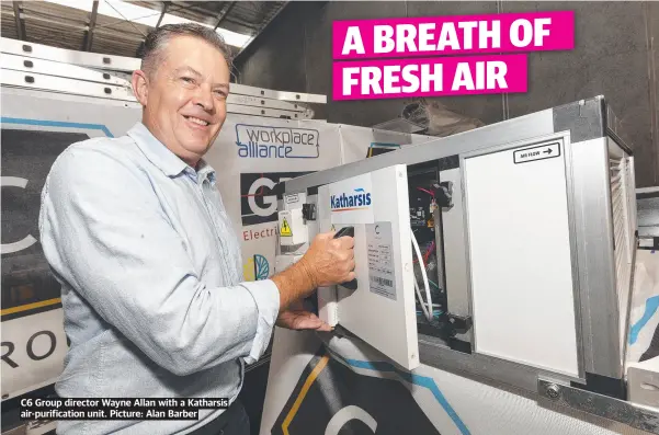  ?? ?? C6 Group director Wayne Allan with a Katharsis air-purificati­on unit. Picture: Alan Barber