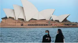  ?? [ Reuters ] ?? Sydney (im Bild die Oper am Hafen) ist Zentrum eines neuen Großausbru­chs der Viren.