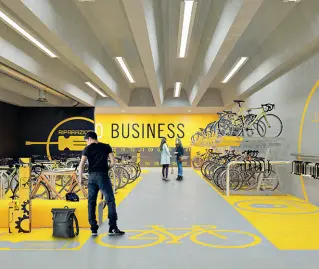  ??  ?? Sostenibil­ità
A sinistra, la simulazion­e di Bikenomist di una spazio aziendale bike friendly. Sopra, bici Pirelli per il corporate sharing