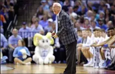  ?? / Getty Images ?? Roy Williams, who coached at North Carolina and Kansas, will be inducted to the National College Basketball Hall of Fame in Kansas City in November.