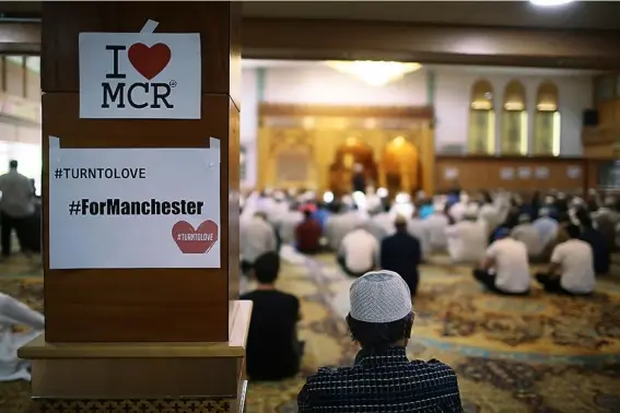  ??  ?? At Friday prayers in Manchester’s Central Mosque, Muslims prayed for those who were killed or injured in the incident, and recited a special prayer for the city (Getty)