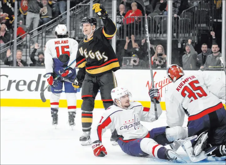  ?? John Locher The Associated Press ?? Center Byron Froese celebrates Saturday night at T-mobile Arena after putting Washington in a 4-0 hole by scoring his first goal with the Golden Knights.
