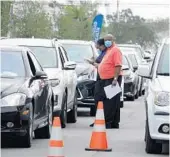  ?? JOE CAVARETTA/SOUTH FLORIDASUN SENTINELPH­OTOS ?? Broward Health, partnered with the City of Fort Lauderdale, inoculated about 450 seniors on Tuesday at a new COVID-19 vaccine site outside Inter Miami CF soccer stadium.