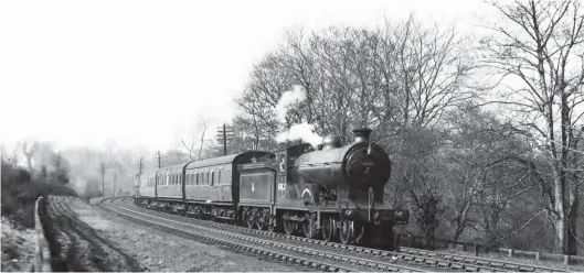  ?? Neville Stead Collection/Transport Treasury ?? Reid ‘Scott’ or ‘D30’ class 4-4-0 No 62423 Dugald Dalgetty – originally North British Railway No 414 of June 1914 – is seen on the main line near Corbridge, east of Hexham, with a Border Counties line service. On this occasion the usual rake of non-corridor ex-LNER stock – two brake thirds sandwichin­g a corridor lavatory – is running with a tail load. Named after a soldier of fortune in Sir Walter Scott’s A Legend of Montrose, this locomotive was a long-standing member of the Hawick allocation, working from that shed from 9 July 1945, when still running as LNER No 9414, through to its withdrawal on 18 December 1957.