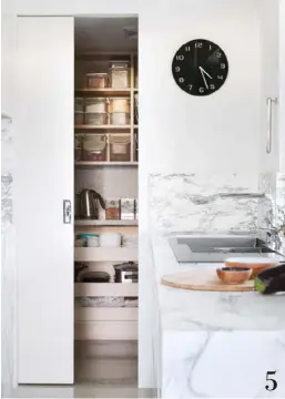  ??  ?? PANTRY PLAY
As is the case with most modern kitchens, ample storage was high on the design wishlist. And homeowner Lyn’s territory, with its bank of overhead lift-up cupboards and under-counter drawers, as well as a large butler’s pantry, delivers...