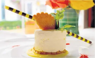  ?? CLAIRE PEREZ/COURTESY ?? Executive Chef Javier Sanchez whips mascarpone and cream to create his ethereal Limoncello dessert at Renato’s in Palm Beach.