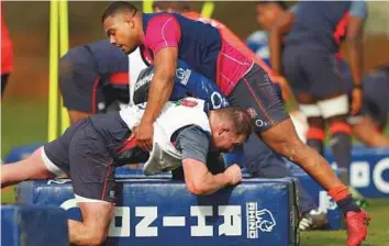  ?? Reuters ?? England’s Dylan Hartley and Kyle Sinckler go through their paces during a training session at the St Edward’s School, Oxford on Wednesday. England defeated Italy 36-15 on Sunday.