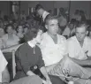  ?? AP ?? Carolyn Bryant rests her head on her husband Roy’s shoulder, after testifying in 1955, in Sumner, Miss., in the murder of Emmett Till. Six decades later, a grand jury declined to indict her for her role in his death.