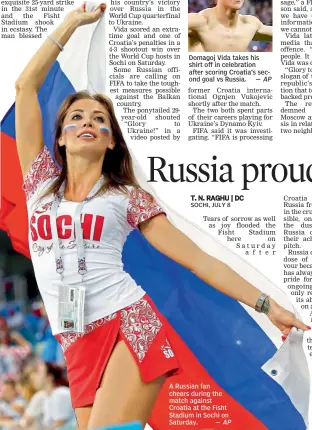  ?? AP ?? A Russian fan cheers during the match against Croatia at the Fisht Stadium in Sochi on Saturday. —