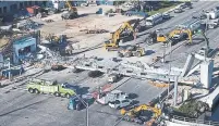  ?? PEDRO PORTAL/MIAMI HERALD/THE ASSOCIATED PRESS ?? Recovery operations continue at the site of the collapsed pedestrian bridge near Florida Internatio­nal University in Miami.