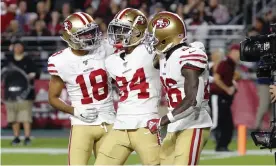  ??  ?? San Francisco 49ers wide receiver Kendrick Bourne (84) celebrates his touchdown against the Arizona Cardinals with wide receiver Dante Pettis (18) and running back Tevin Coleman (26) on Thursday night. Photograph: Rick Scuteri/AP