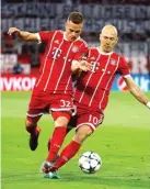  ?? KAI PFAFFENBAC­H/REUTERS ?? JANGAN REBUTAN: Arjen Robben (kanan) dan Joshua Kimmich samasama ingin mengamanka­n bola di area pertahanan Bayern Muenchen.