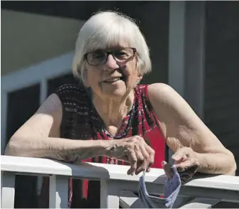  ?? BY CARL ZITZMANN ?? Sue Davis Gabbay on the porch of the Washington School, awaiting the arrival of her many well wishers.