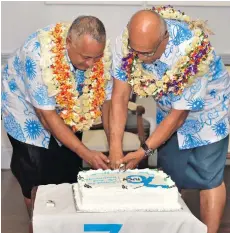  ?? Photo: DEPTFO News ?? Regional Director for IUCN Oceania Mason Smith and President Major General (Ret’d) Jioji Konrote cutting the cake at the IUCN 70th Anniversar­y at the French Ambassador’s residence at Ratu Sukuna Road in Suva on October 5, 2018.