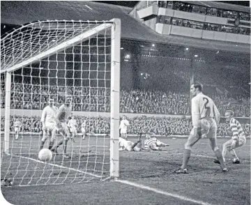  ??  ?? John Hughes scores the equaliser at the Celtic End in the 1970 European Cup semi-final