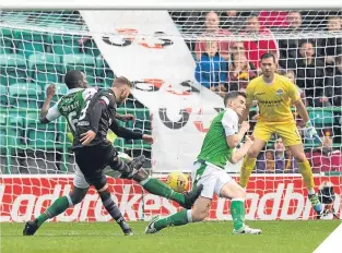  ??  ?? Motherwell’s Louis Moult scores to make it 2-2.