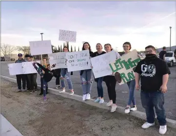  ?? NICK SMIRNOFF / FOR THE CALIFORNIA­N ?? Students stage a rally at Tehachapi High School on Friday in support of the statewide “Let Them Play” movement, a grassroots action dedicated to opening up school sports programs during the pandemic.