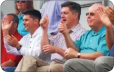  ??  ?? Cheering on the firefighte­rs, from left, are Bucks County Commission­er Rob Loughery, Pennsylvan­ia Lt. Governor Jim Cawley and Bucks County Commission­er Charlie Martin.