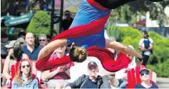  ??  ?? Molly uses aerial silks as she performs at Festival Park. Silver Starlets shows continue today and Monday.