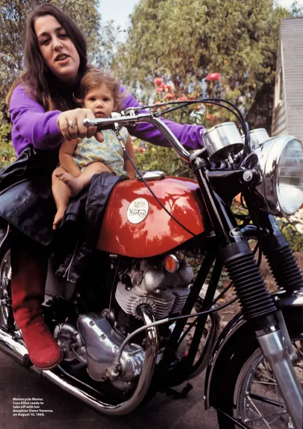  ??  ?? Motorcycle Mama: Cass Elliot ready to take off with her daughter Owen Vanessa, on August 10, 1968.