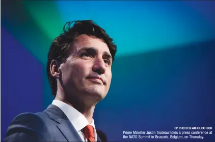  ?? CP PHOTO SEAN KILPATRICK ?? Prime Minister Justin Trudeau holds a press conference at the NATO Summit in Brussels, Belgium, on Thursday.