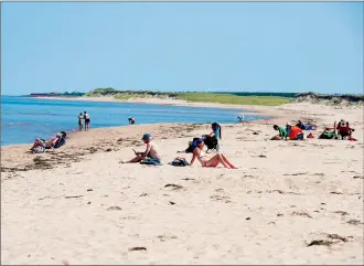  ?? Canadian Press photos ?? The beach on the Greenwich peninsula portion of Prince Edward Island National Park is seen in Greenwich, Prince Edward Island on Aug. 29. The site contains an extensive and fragile coastal dune system, wetlands and various natural habitats in which...