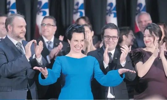  ?? PIERRE OBENDRAUF ?? Montreal Mayor Valérie Plante with members of the city council at swearing-in ceremony at Marché Bonsecours on Thursday.